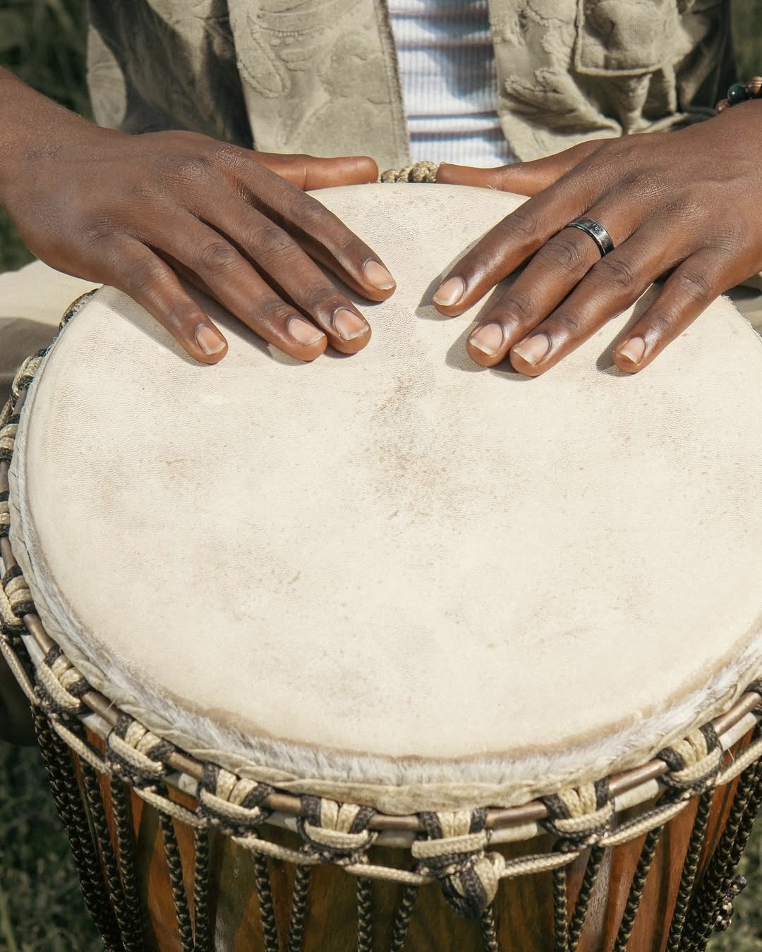 Marc's hands on his djembe